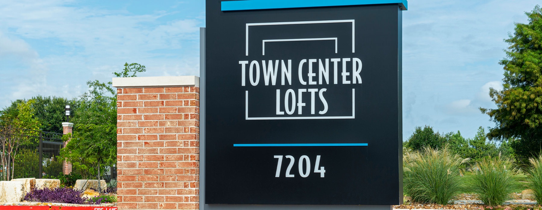 Town Center Lofts sign on property